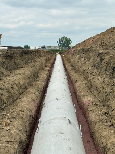 Pipe laid in ground.
